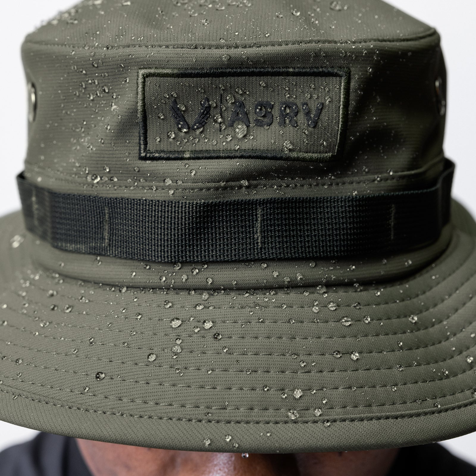 Waterproof Vented Boonie Hat in Dark Olive, worn view