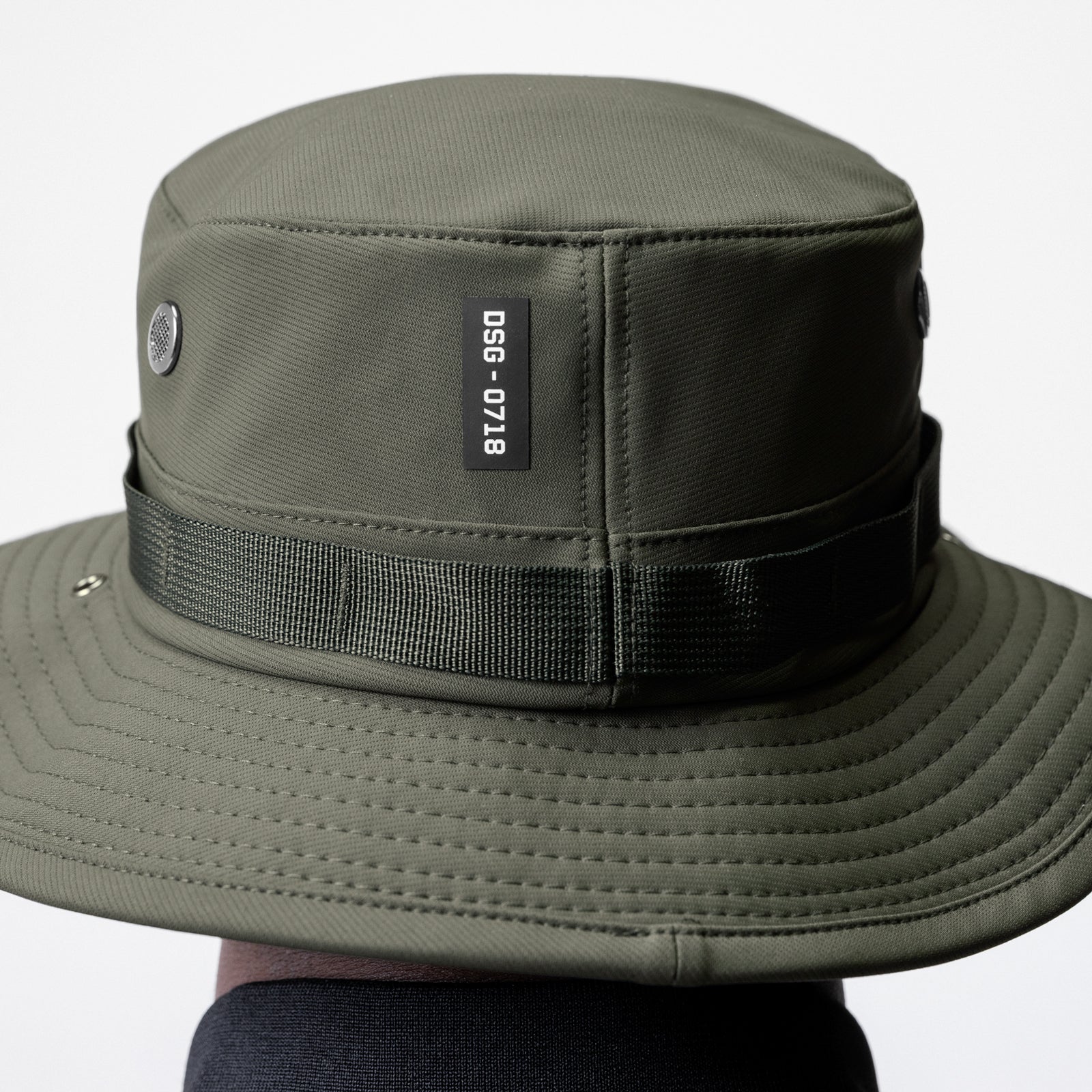 0718 Waterproof Vented Boonie Hat in Dark Olive, worn by model, front view