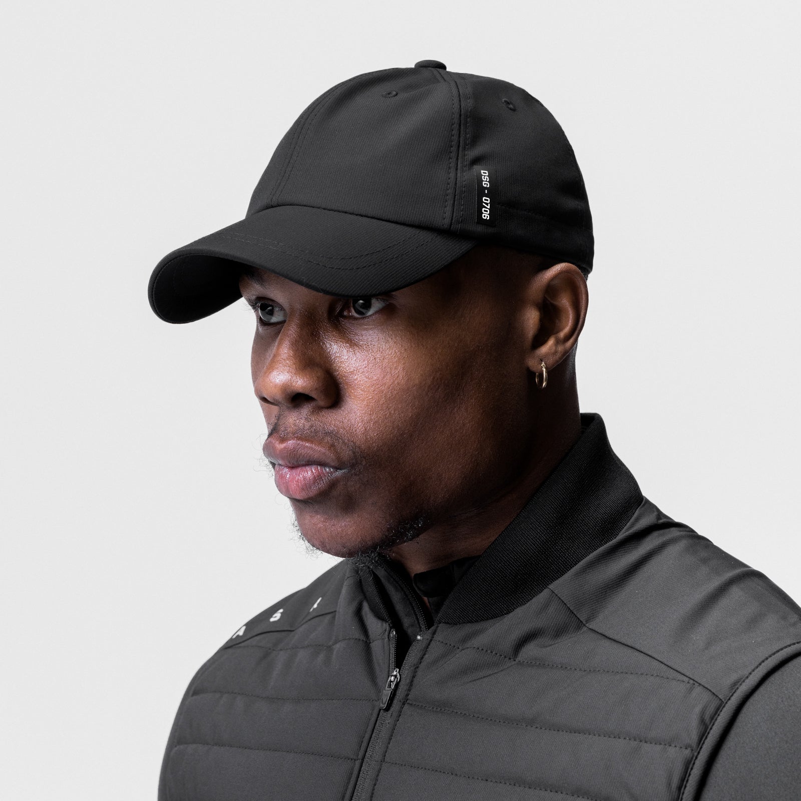 SilverPlus™ Cinch Hat in black, worn by model in side profile view