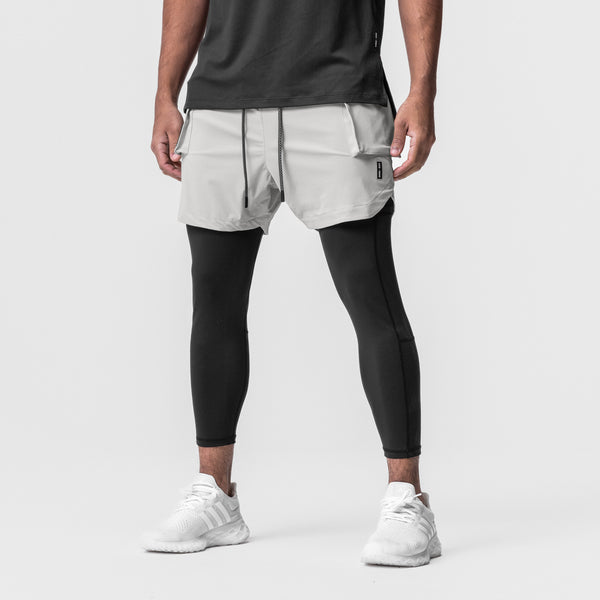 0688. Tetra-Lite™ 2-in-1 Legging Cargo Short - Stone/Black