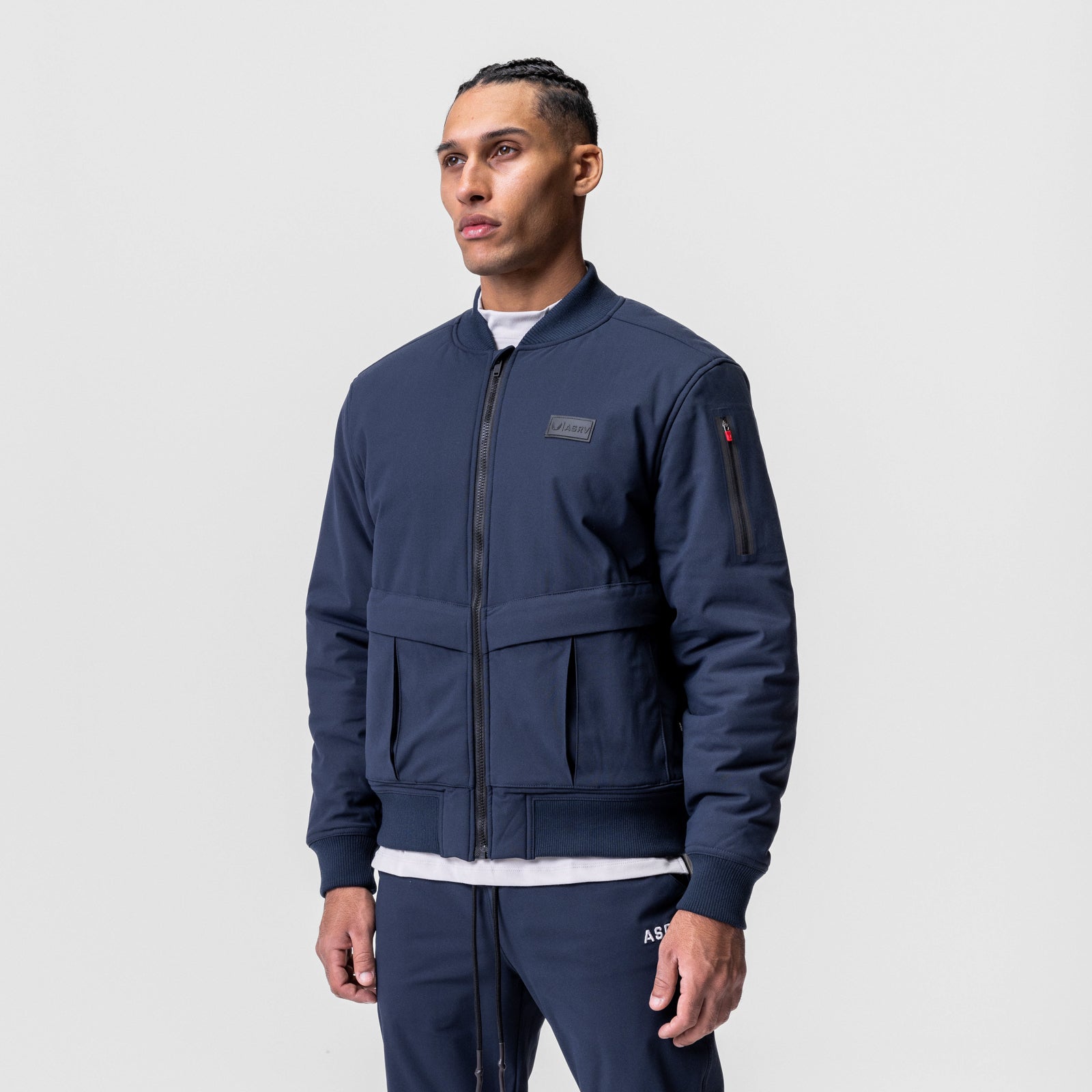 Kinterra Weatherproof Bomber Jacket in navy, worn by model, front view