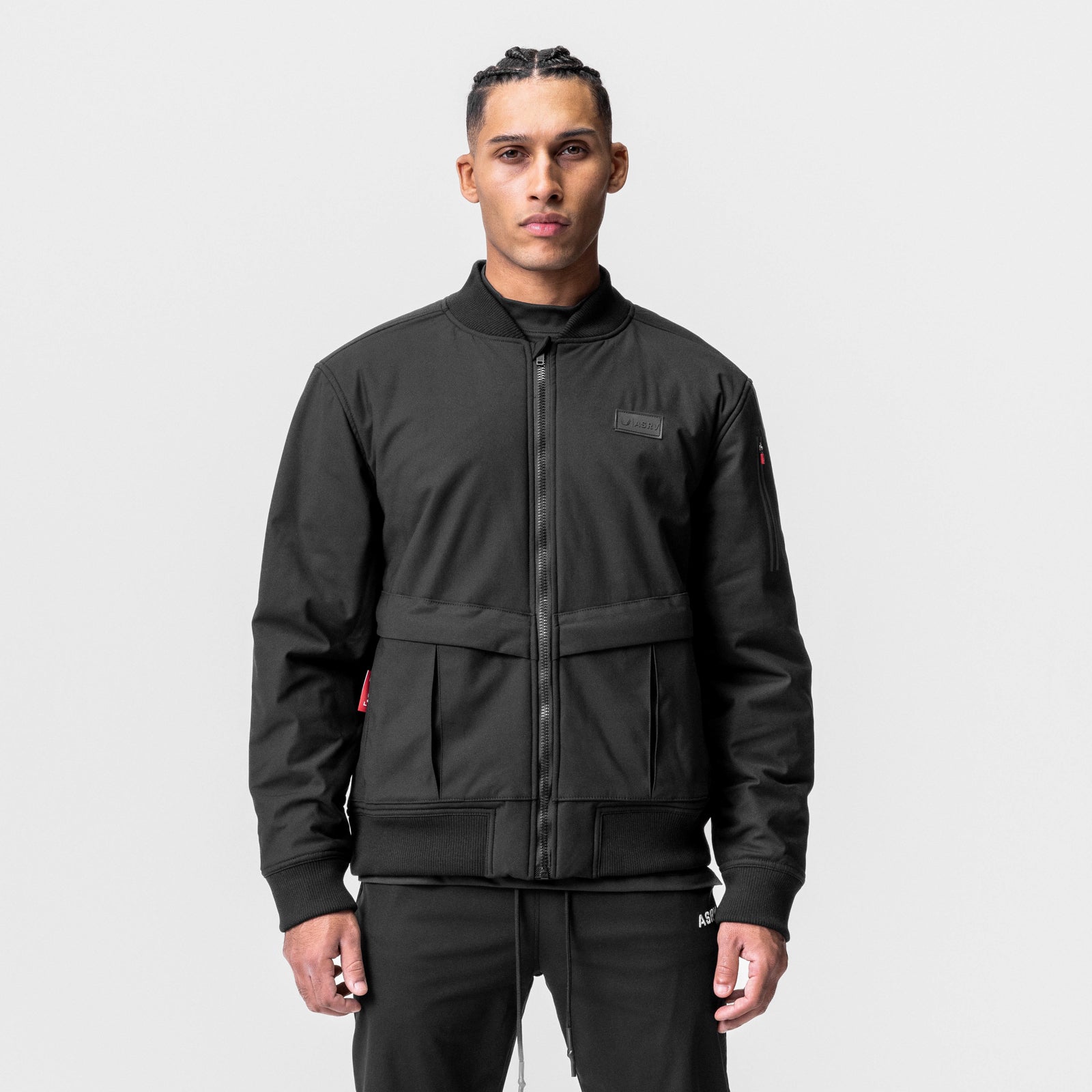 Kinterra Weatherproof Bomber Jacket in black, worn by model facing camera