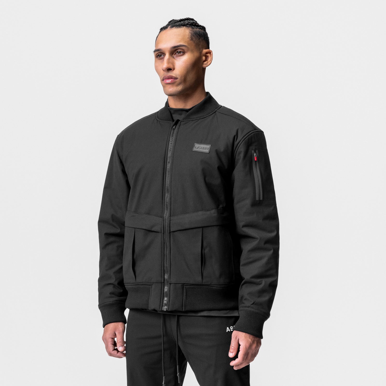 Kinterra™ Weatherproof Bomber Jacket in black, worn by model facing forward