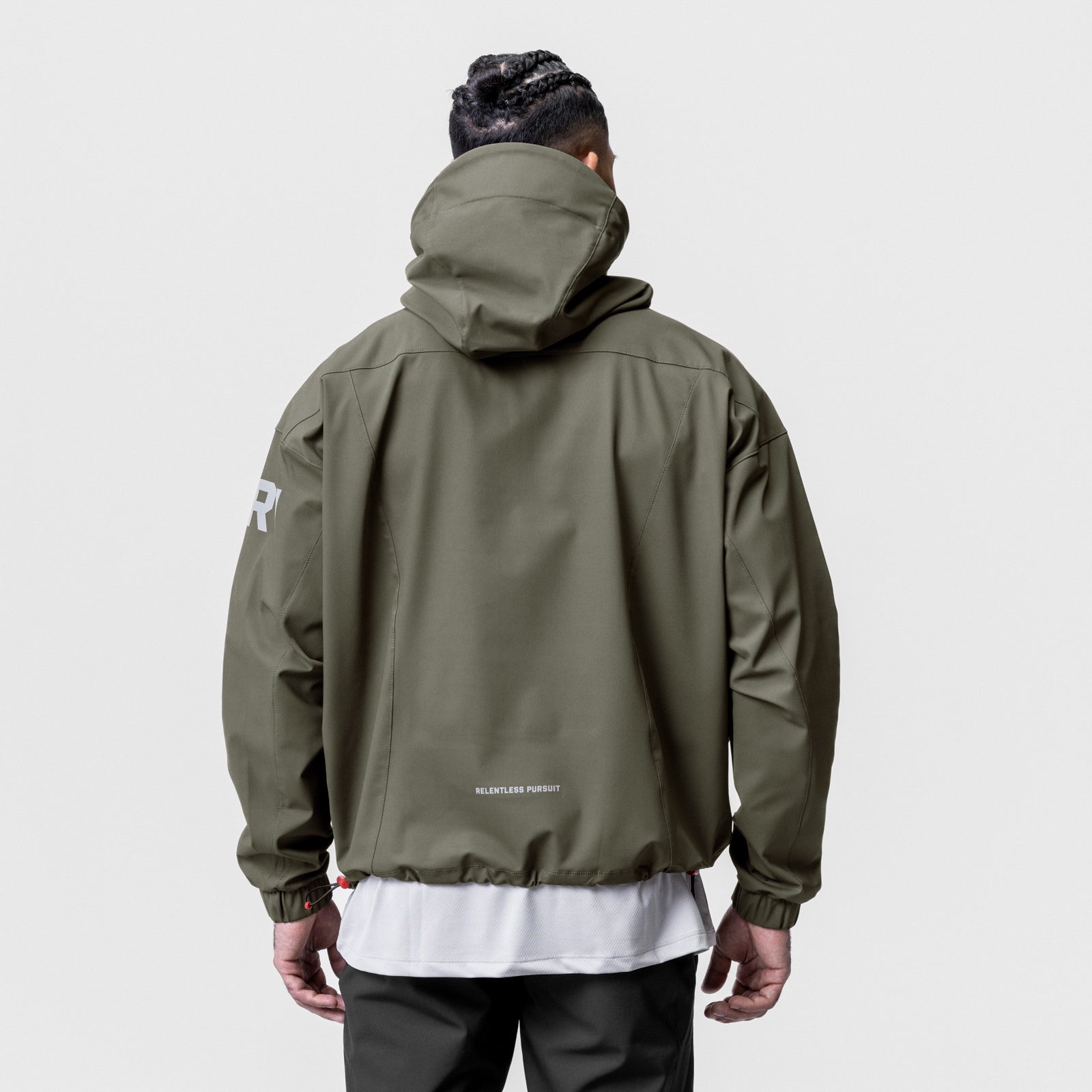 Weather-Ready Anorak Jacket in olive, worn by model shown from back view