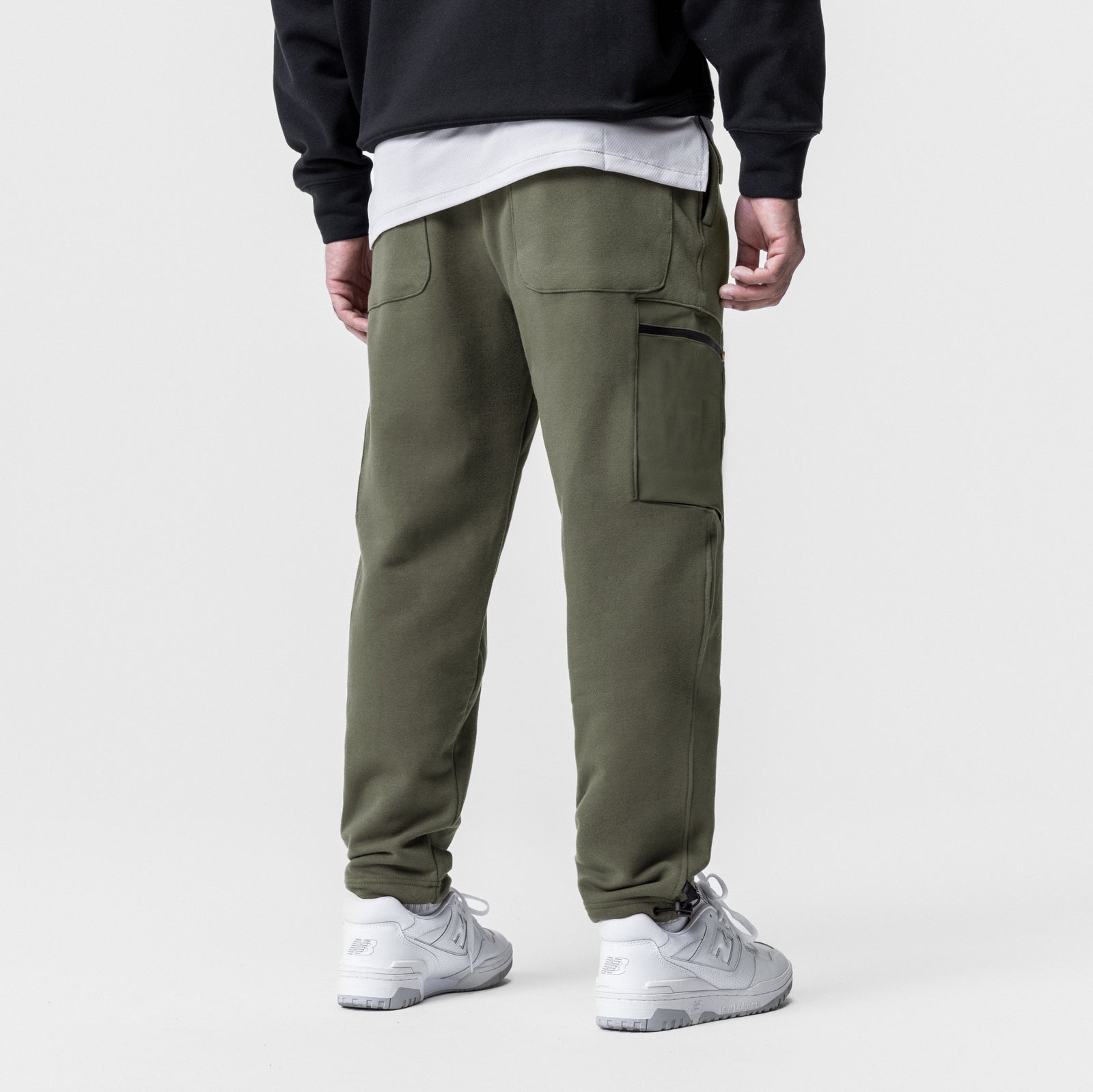 Tech-Terry Cinch Cargo Jogger in olive worn by model, back view