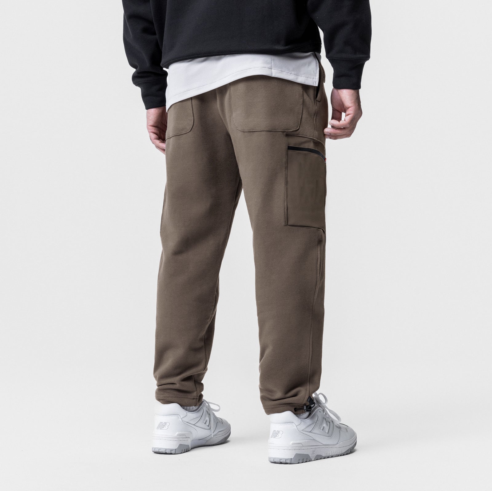 Tech-Terry Cinch Cargo Jogger in deep taupe, back view worn with white sneakers