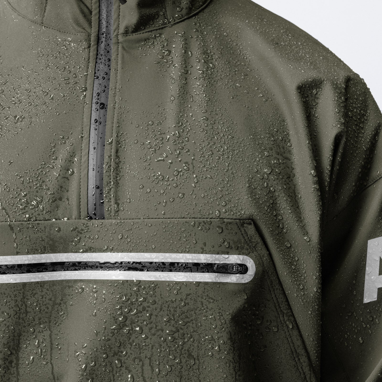 Weather-Ready Anorak Jacket in olive with water beads, detail shot of chest pocket and zipper