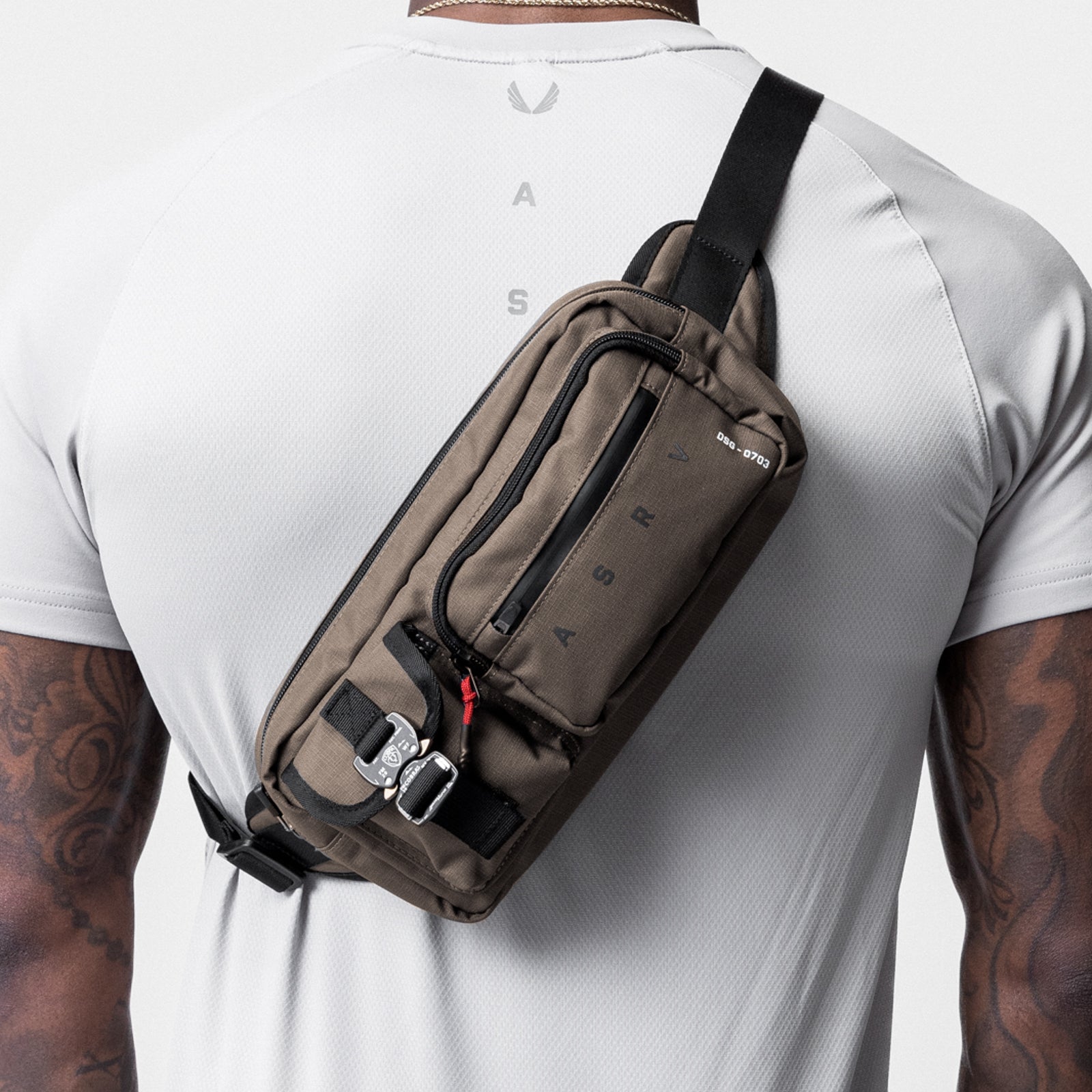 0703 Cordura® Tech Crossbody Pack in Deep Taupe, worn on shoulder