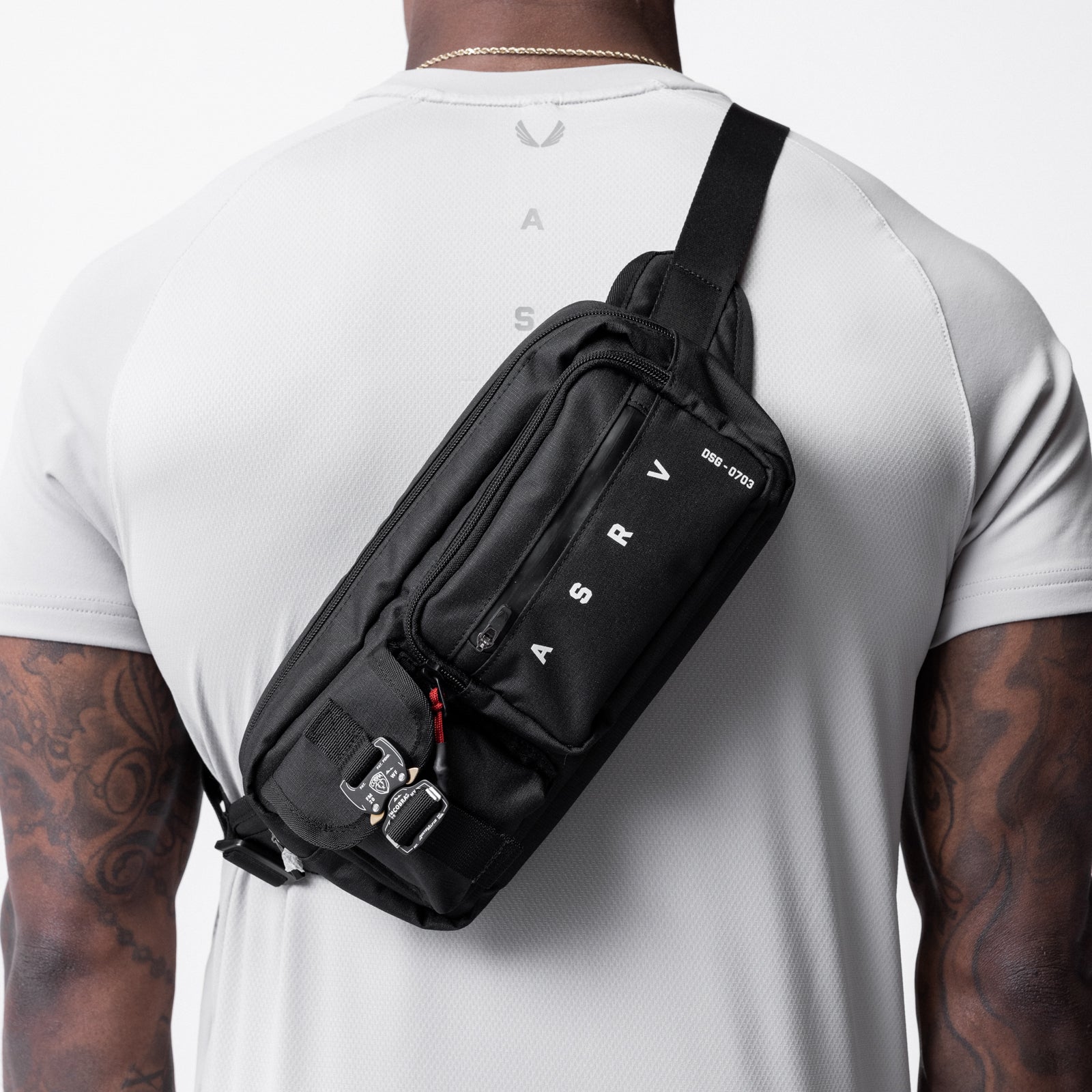 0703 Cordura® Tech Crossbody Pack in black, worn across back