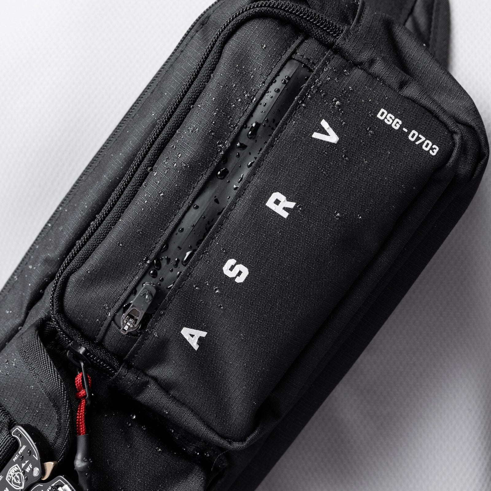 0703 Cordura® Tech Crossbody Pack in black, worn across body