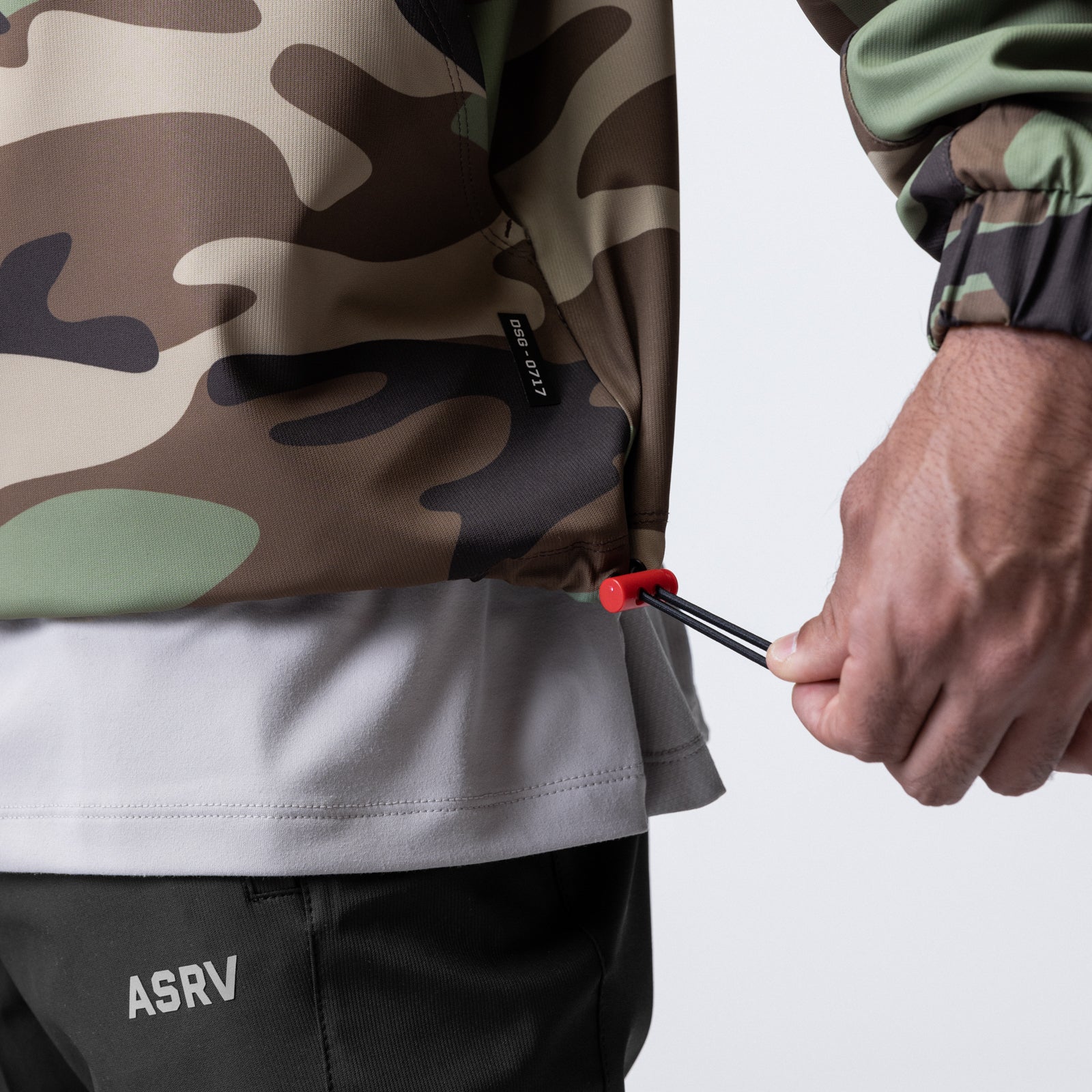Weather-Ready Anorak Jacket in Woodland Camo worn by model, detail of drawstring and pocket