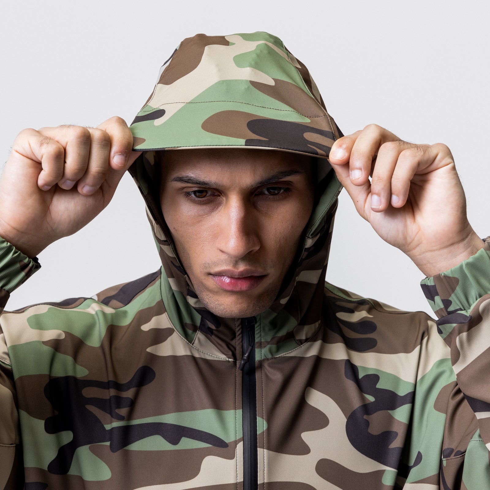 Weather-Ready Anorak Jacket in Woodland Camo, model wearing and adjusting hood