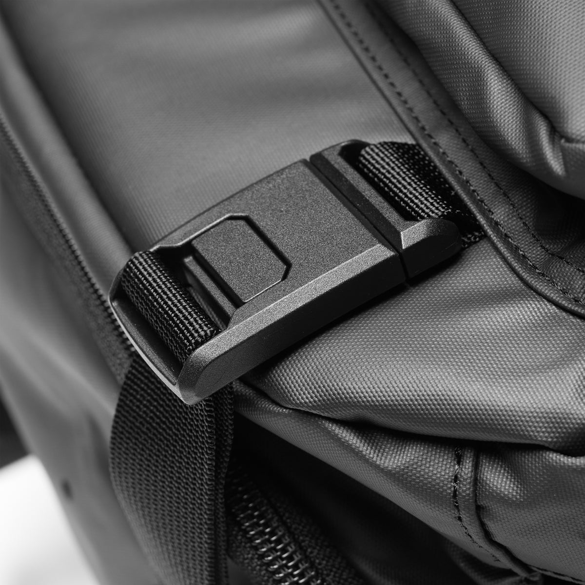 Flatlay Waterproof Large Travel Backpack in Black, buckle detail closeup