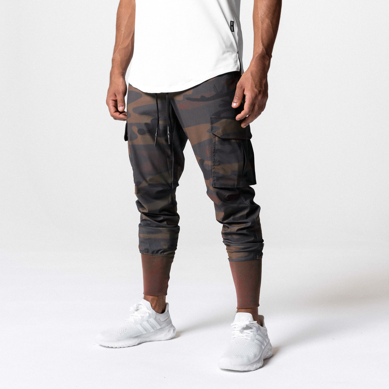 Tetra-Lite® Cargo High Rib Jogger in rust camo, worn by model, front view
