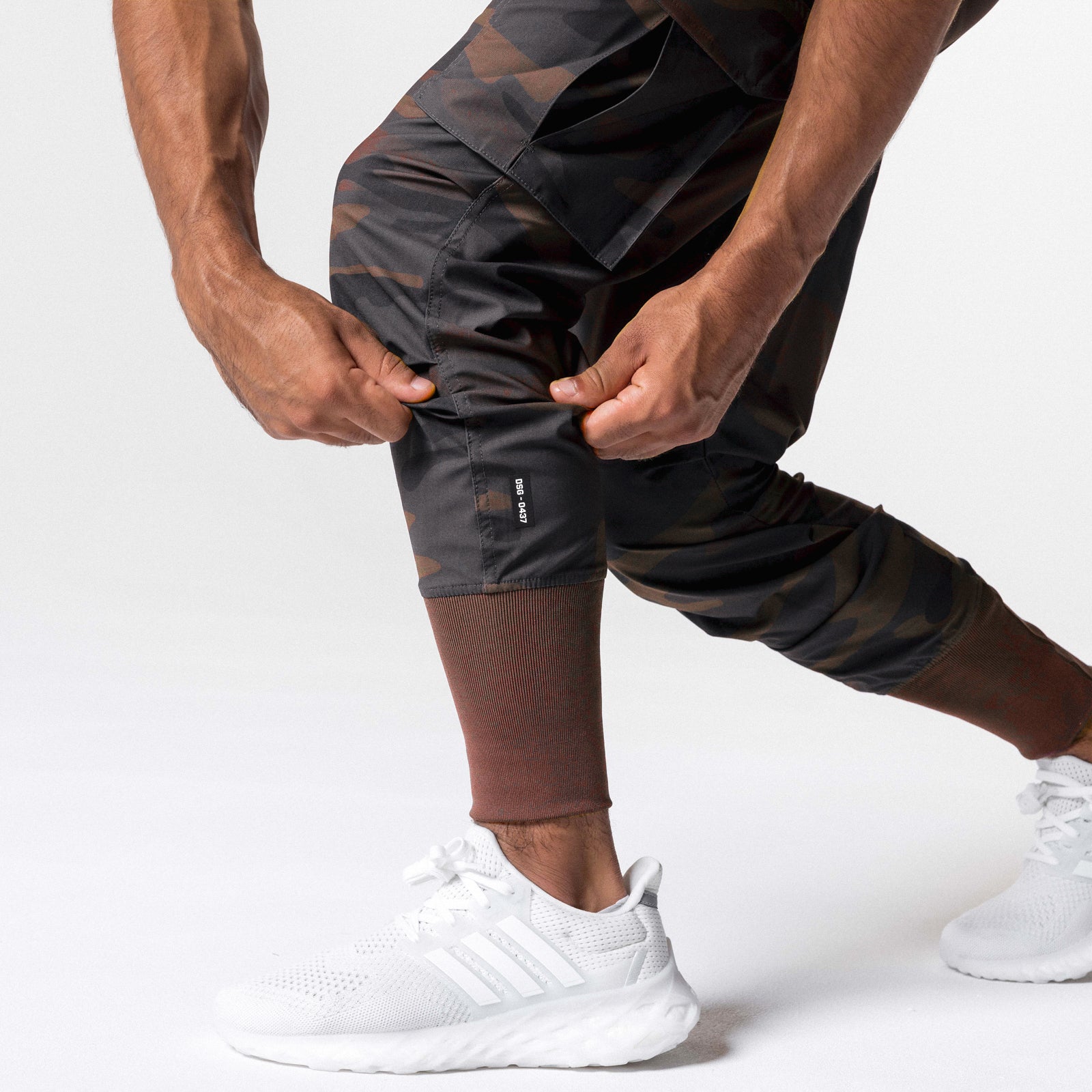 Tetra-Lite Cargo High Rib Jogger in rust camo, worn by model showing fit and detail