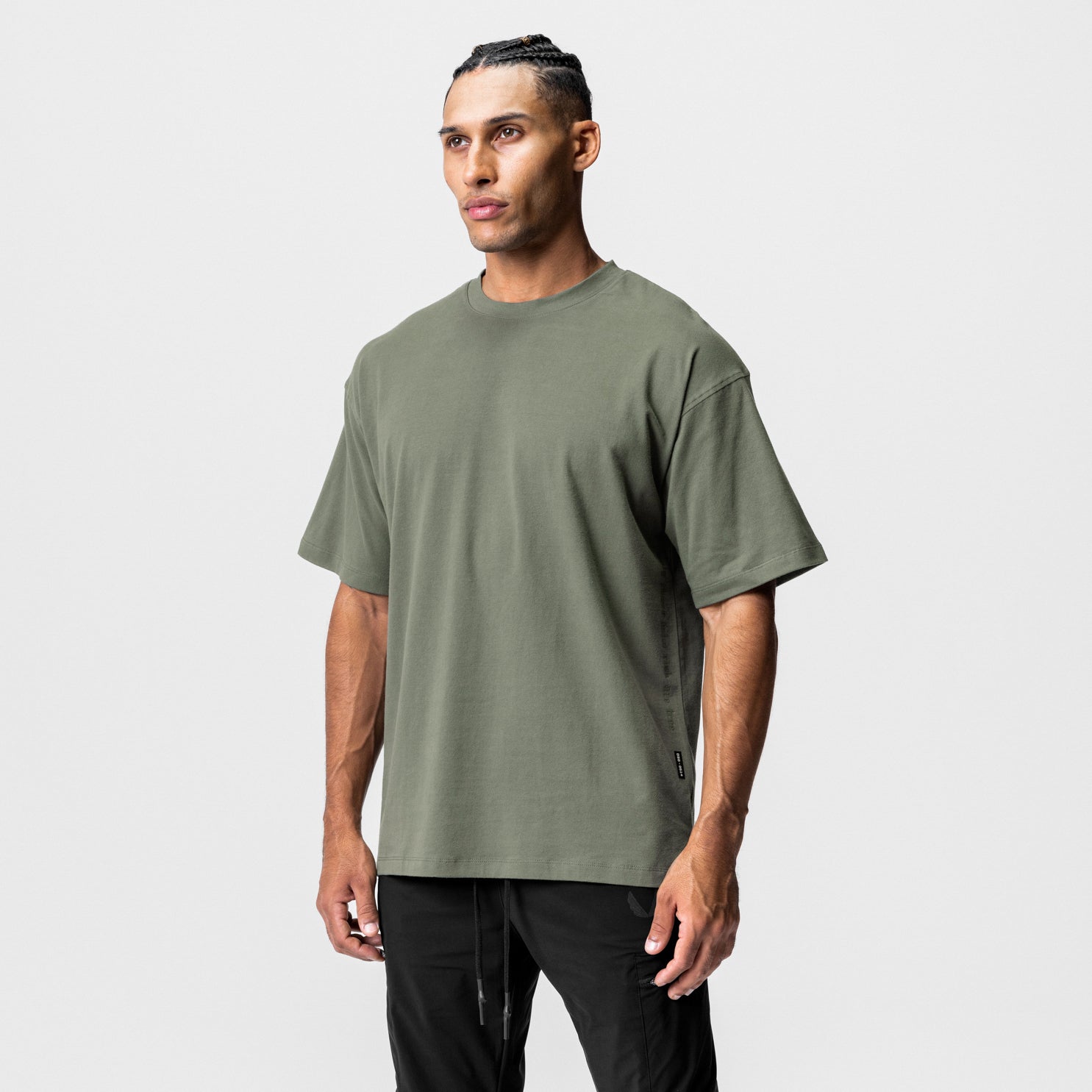CottonPlus Oversized Tee in olive, worn by model, front view