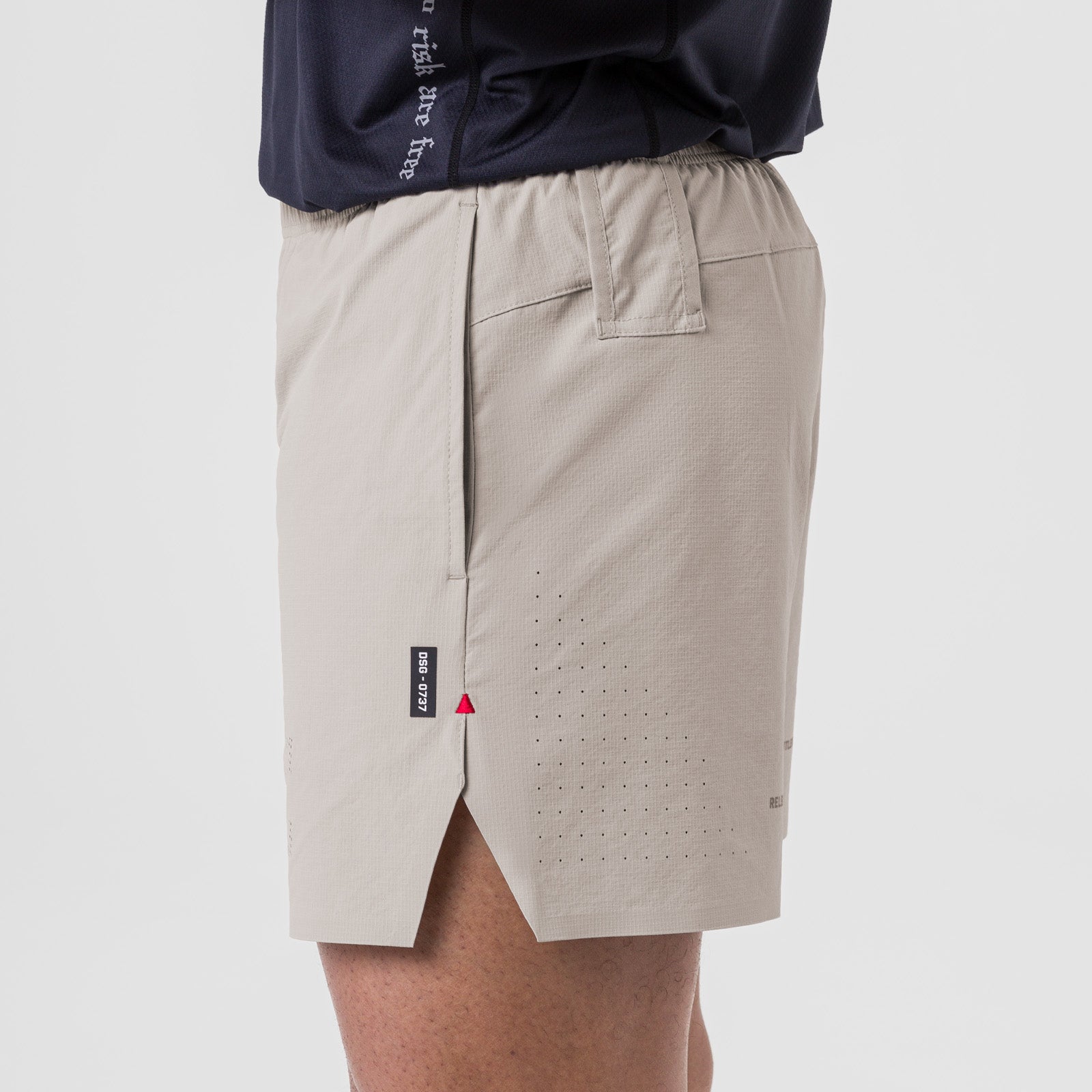 Ripstop 6" Perforated Short in Chai, modeled on person, side view