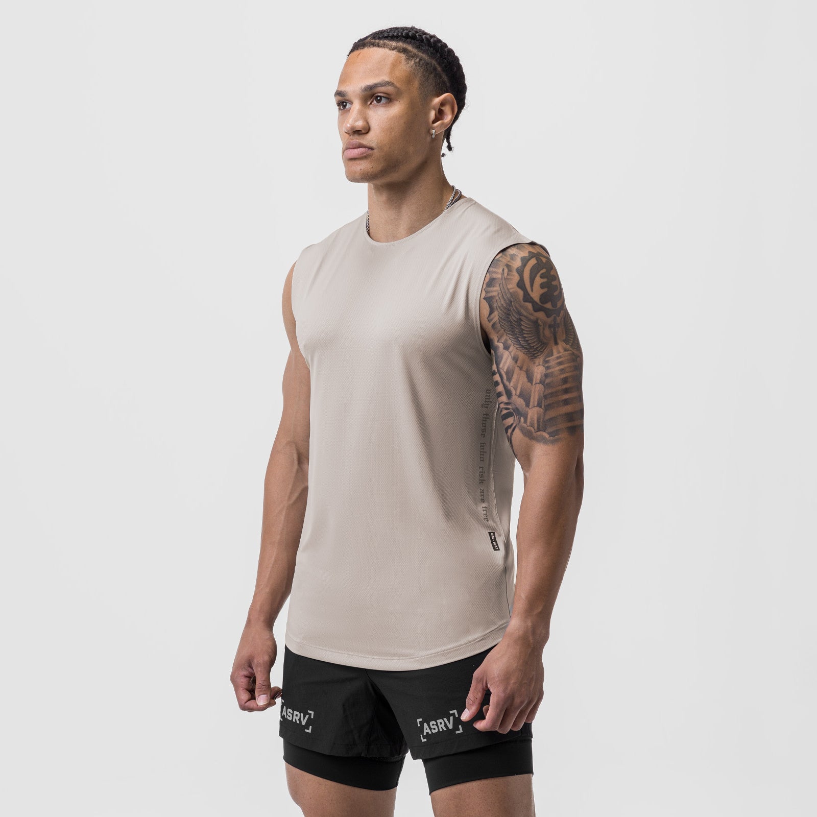 AeroSilver Cutoff Tank in chai worn by model, side profile view