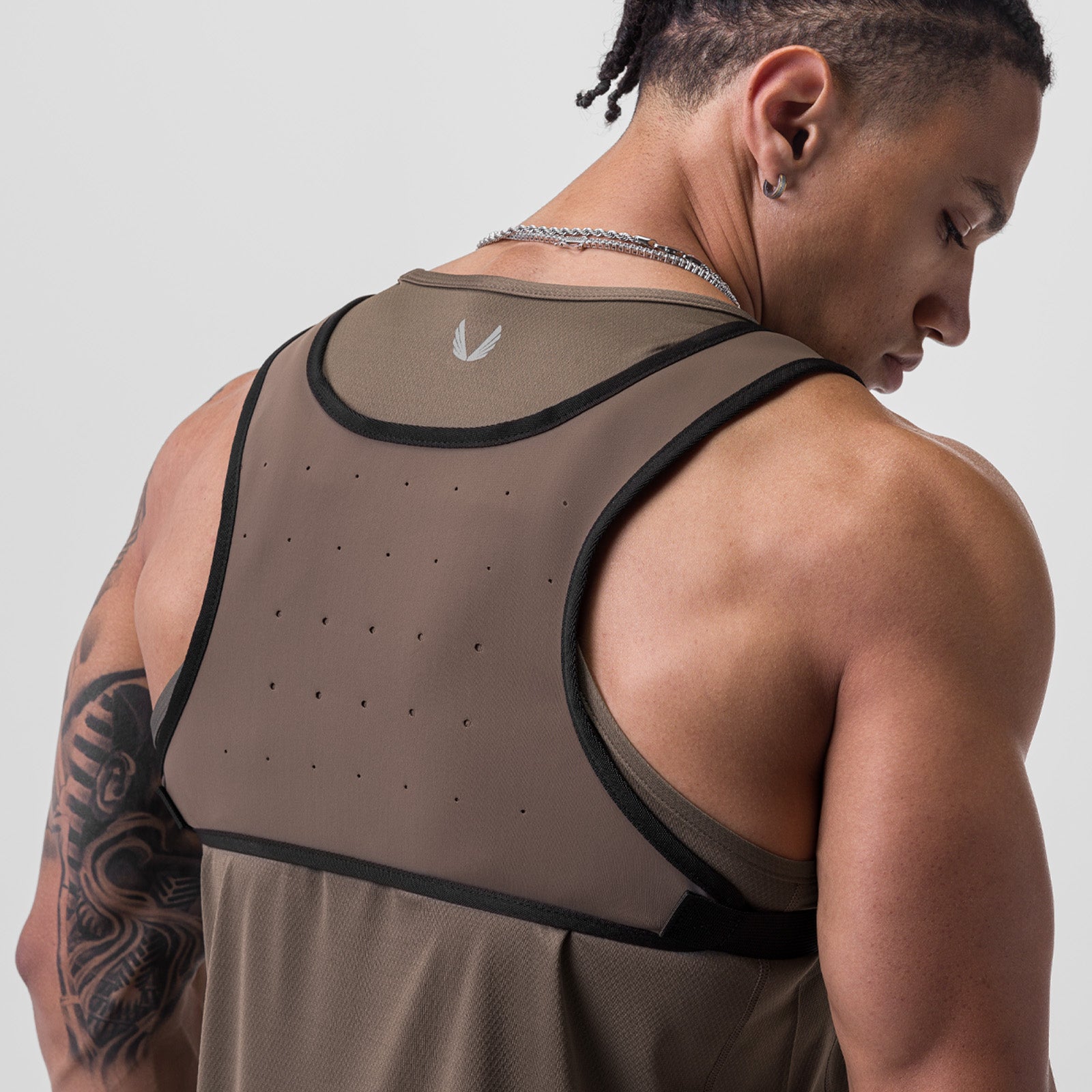 0711 Cordura Lightweight Chest Pack in Deep Taupe, back view on model