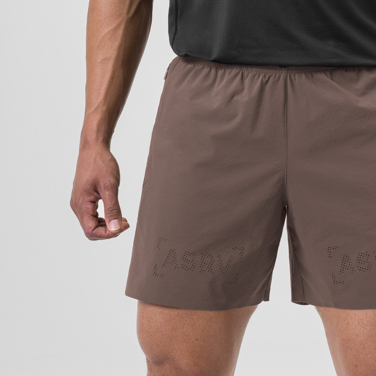 Ripstop 6" Perforated Short in Deep Taupe, worn by model showing front detail