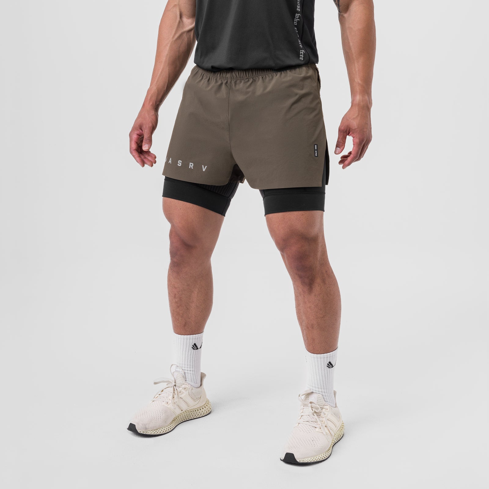 Ripstop 3" High Split Liner Short in deep taupe and black worn by model, front view