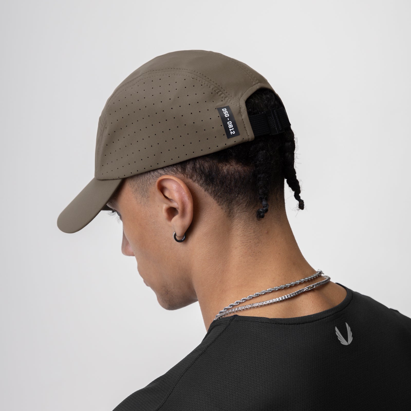 Tetra-Lite Lightweight Vented Hat in Deep Taupe, worn by model in profile view