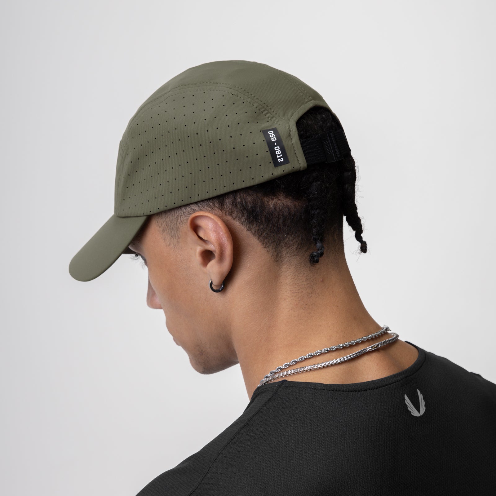 Tetra-Lite Lightweight Vented Hat in olive, worn by model in side profile view