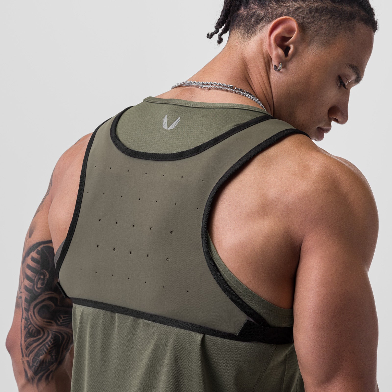 0711 Cordura Lightweight Chest Pack in Olive, worn by model, back view