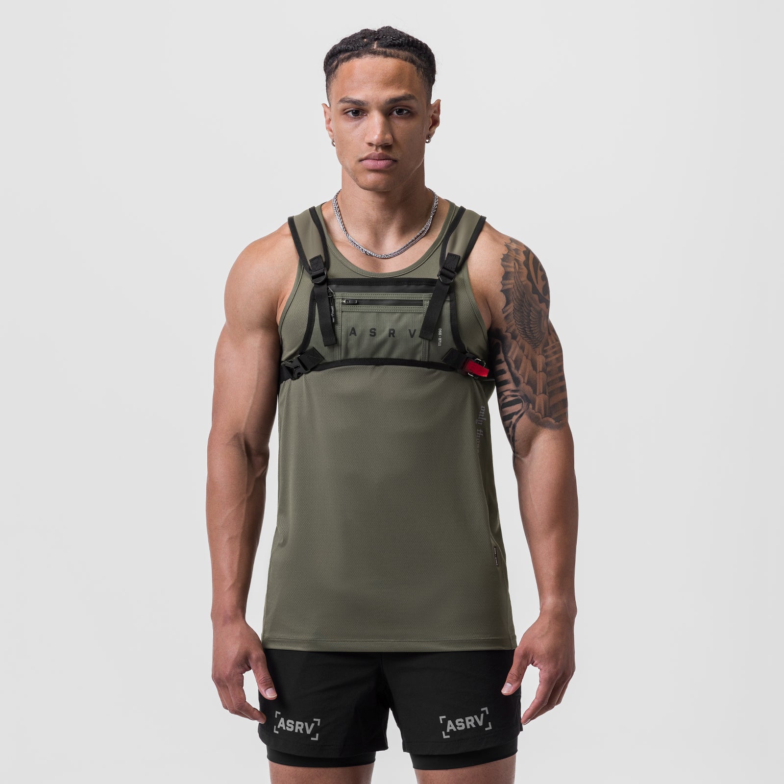 0711 Cordura® Lightweight Chest Pack in Olive, worn by model