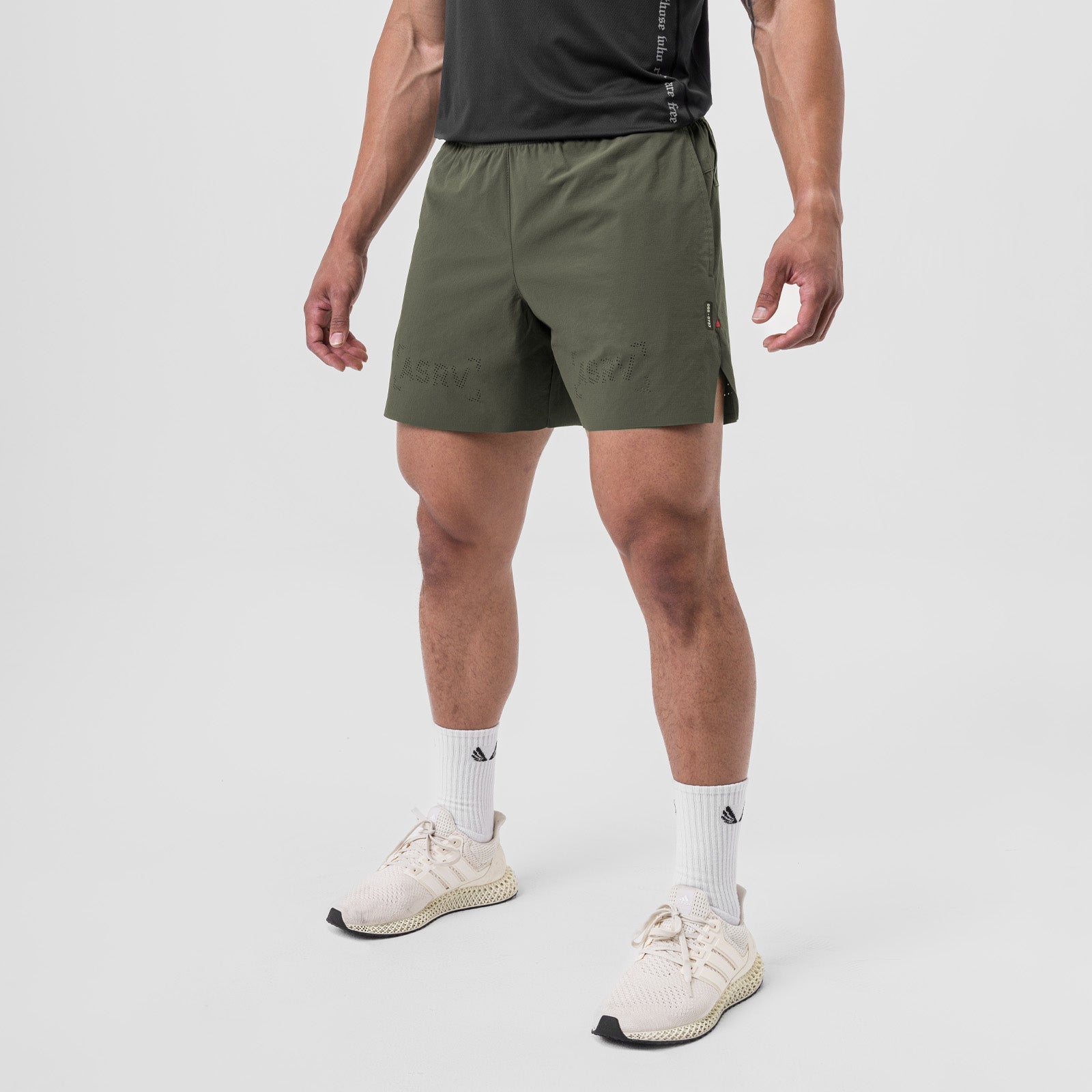 Ripstop 6" Perforated Short in olive worn with white socks and cream sneakers, front view