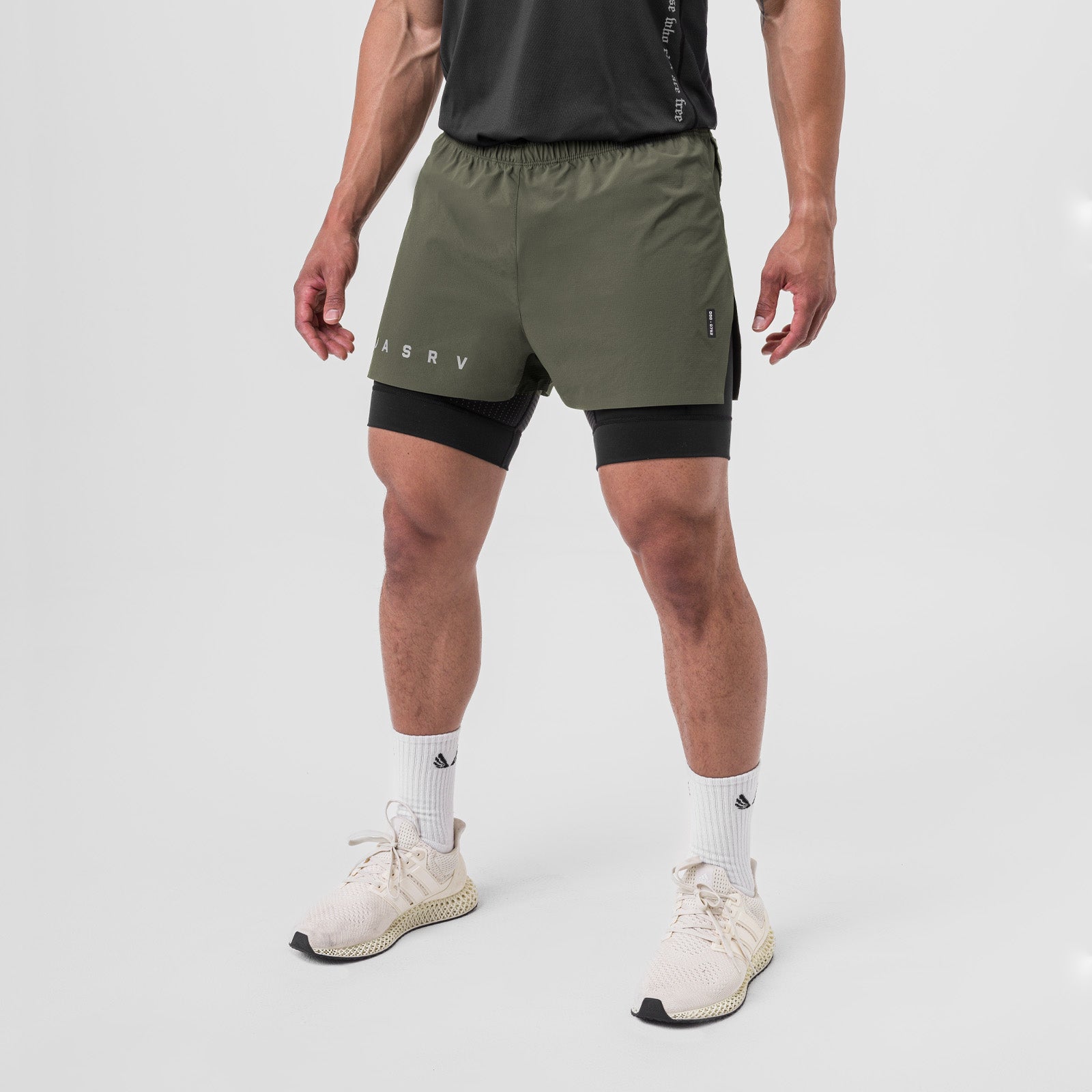 Ripstop 3" High Split Liner Short in olive and black, worn by model, front view