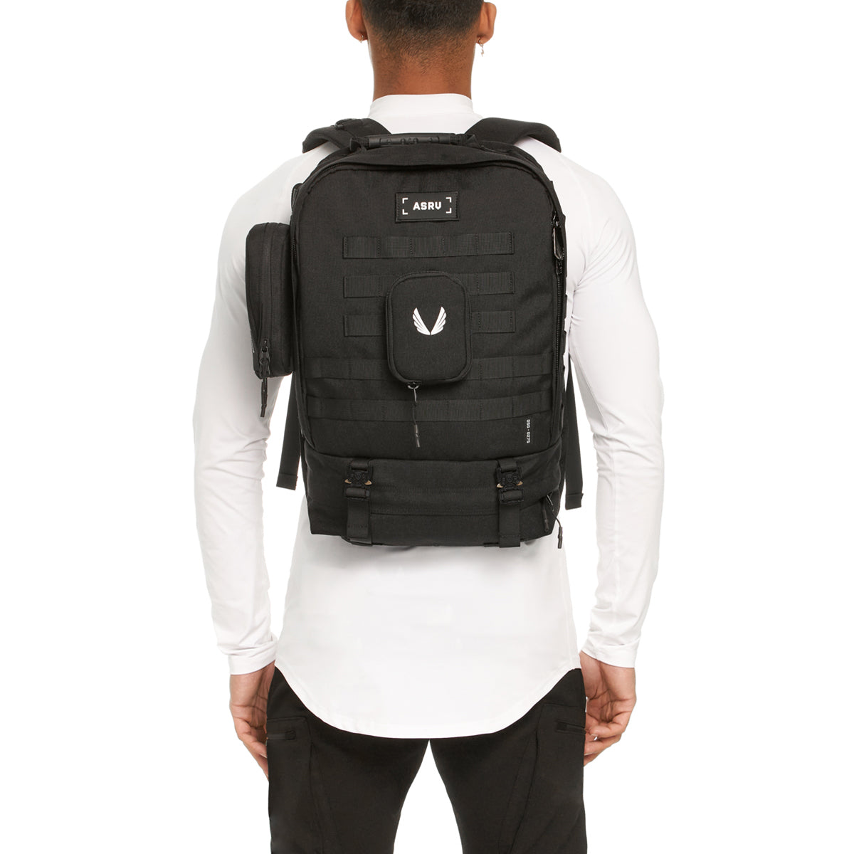 0275 Modular Everyday Pack in black, back view worn by model