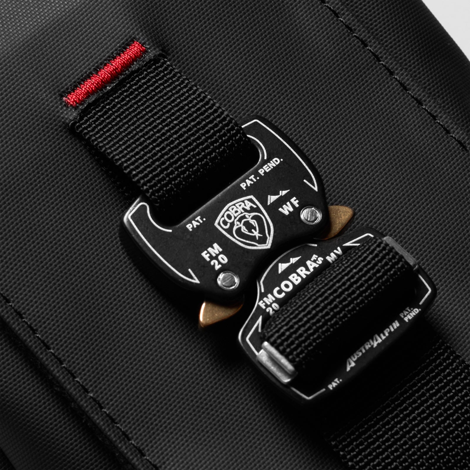 flatlay Waterproof Phone Holster Bag in black with red accent strap, front and back view