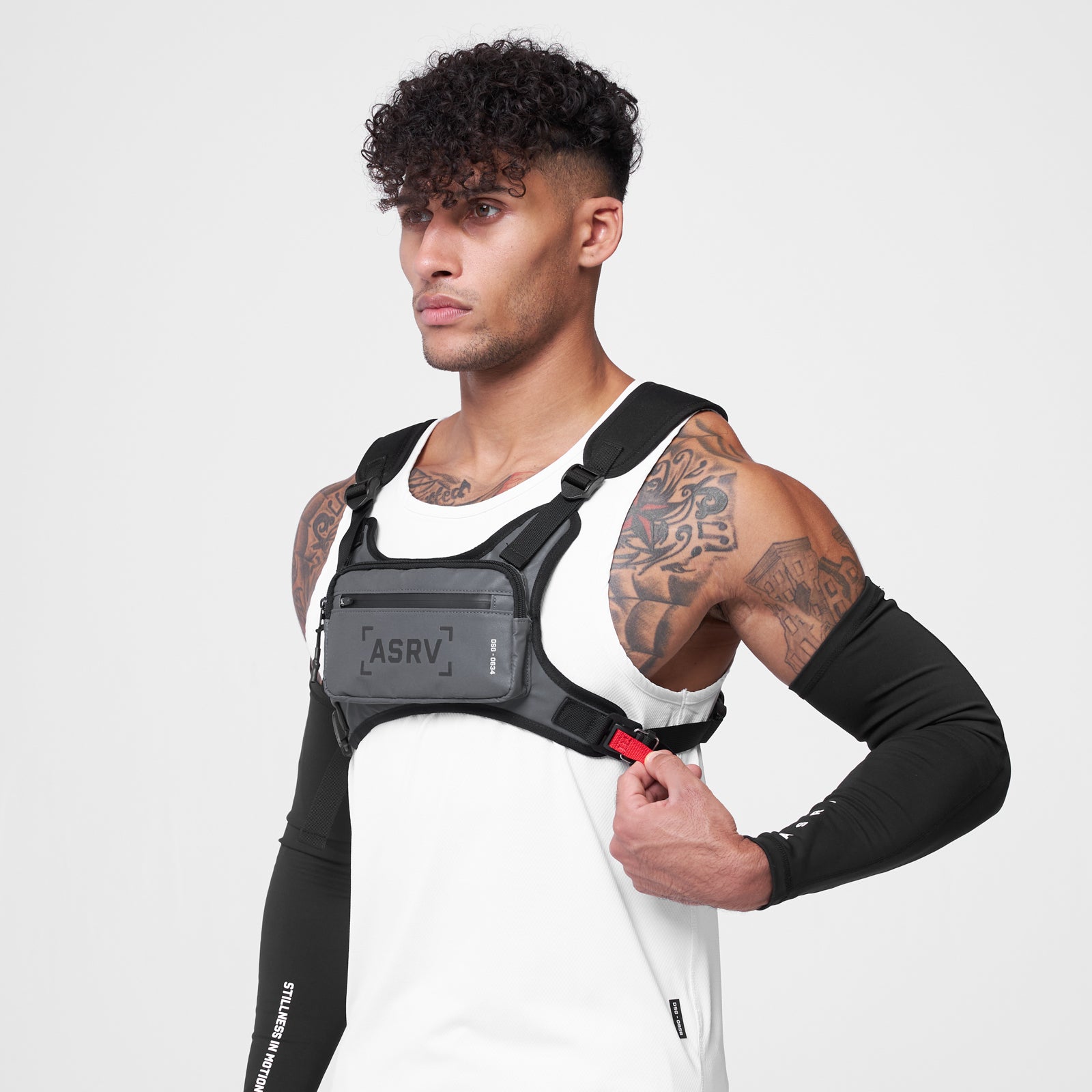 0634 Conditioning Chest Pack in grey reflective, worn by male model