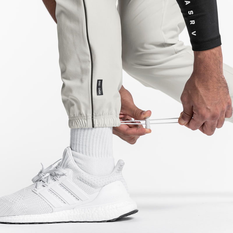 0494. Ultralight Reflective Relaxed Fit Track Pant - Stone