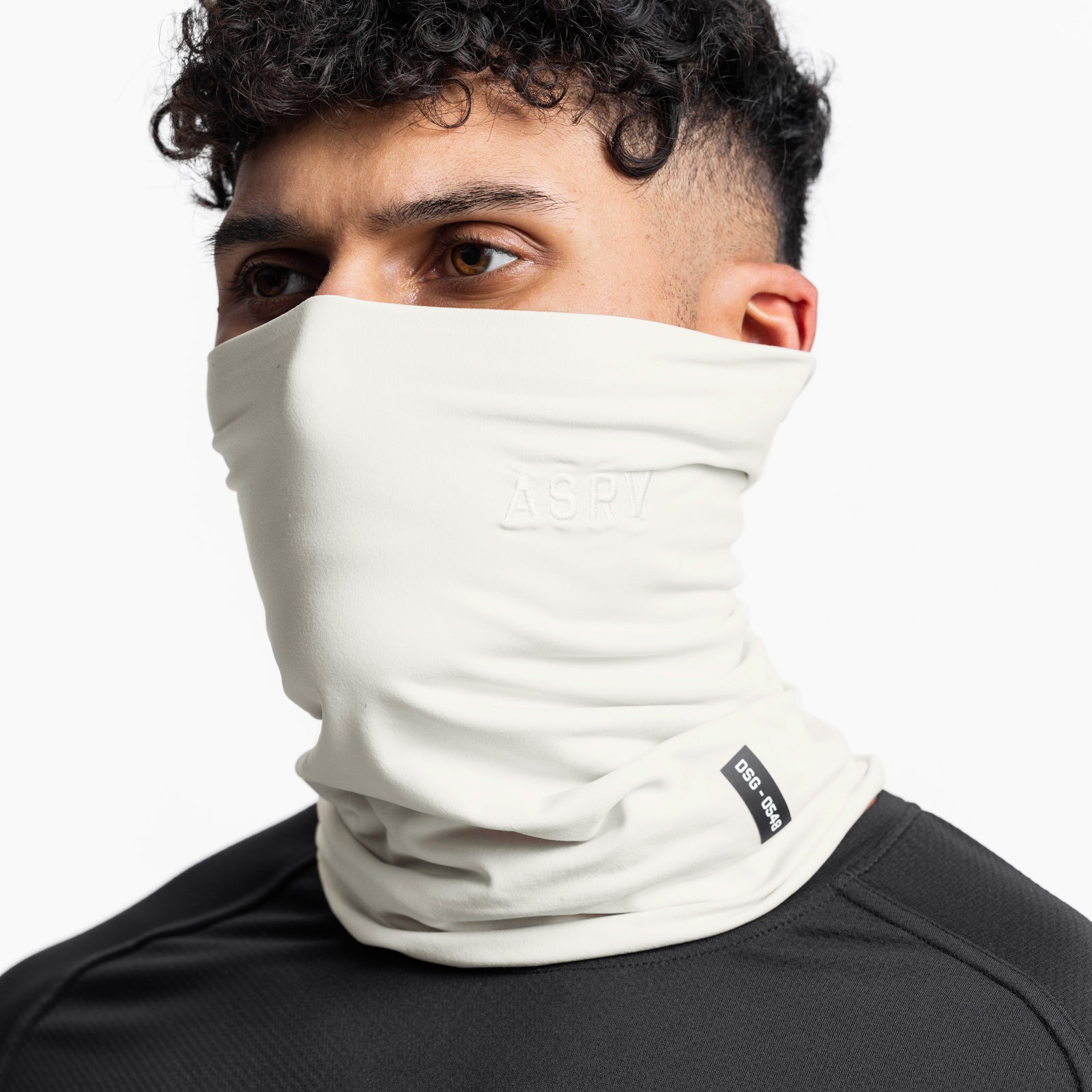 Thermal Gaiter in ivory cream worn as neck gaiter on male model, front view