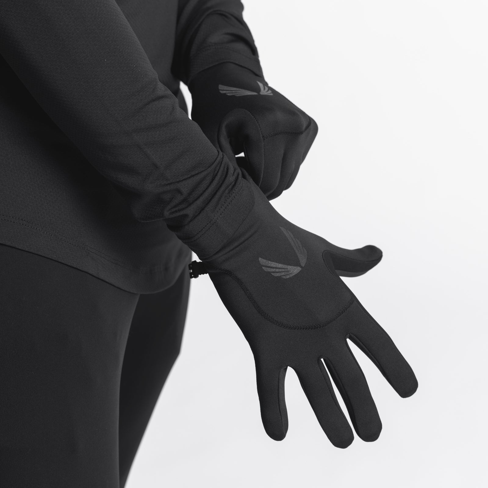 Aeroheat® Lightweight Gloves in black, worn on model's hands showing palm and back details