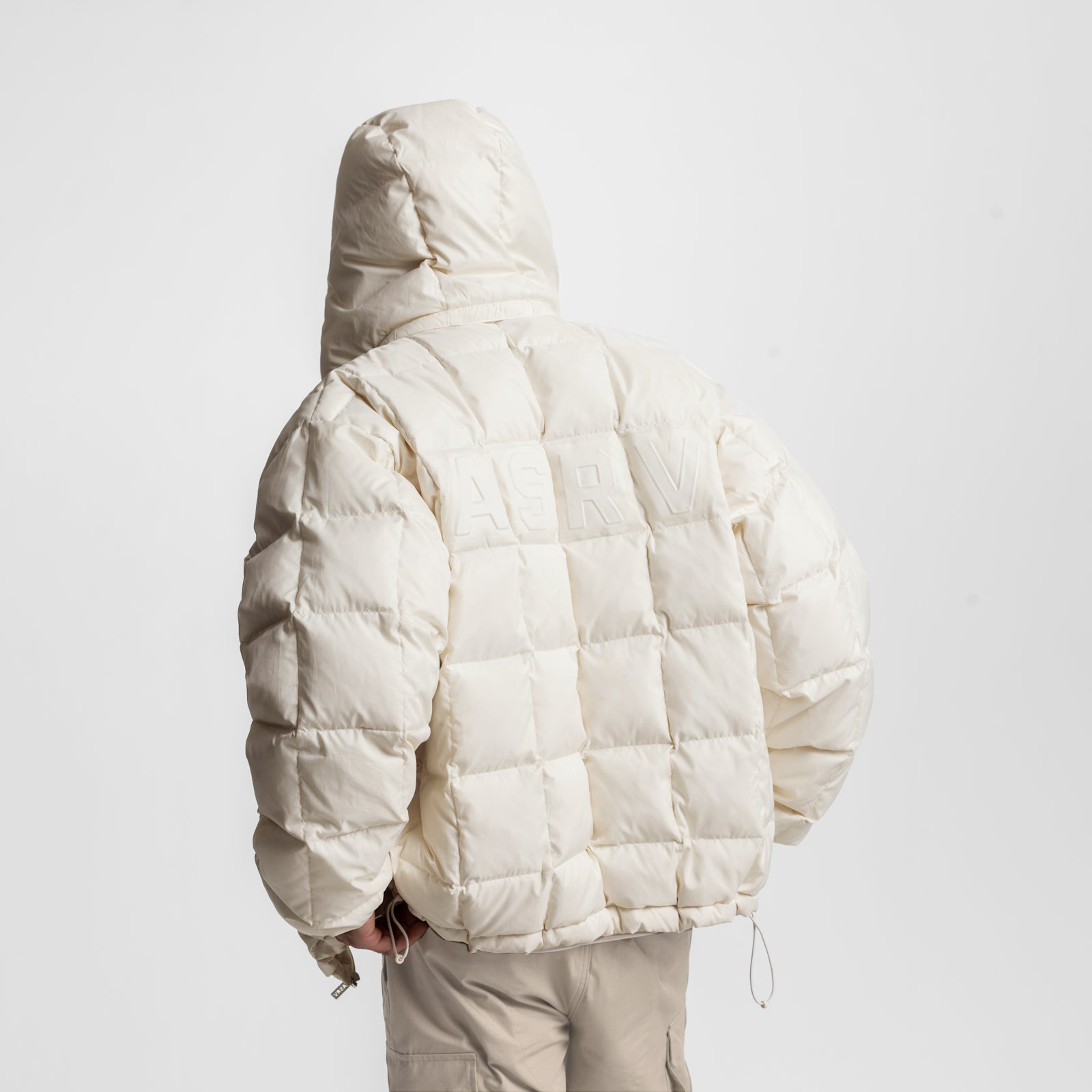 Weather-Ready Down Puffer Jacket in ivory cream, back view on model with hood up