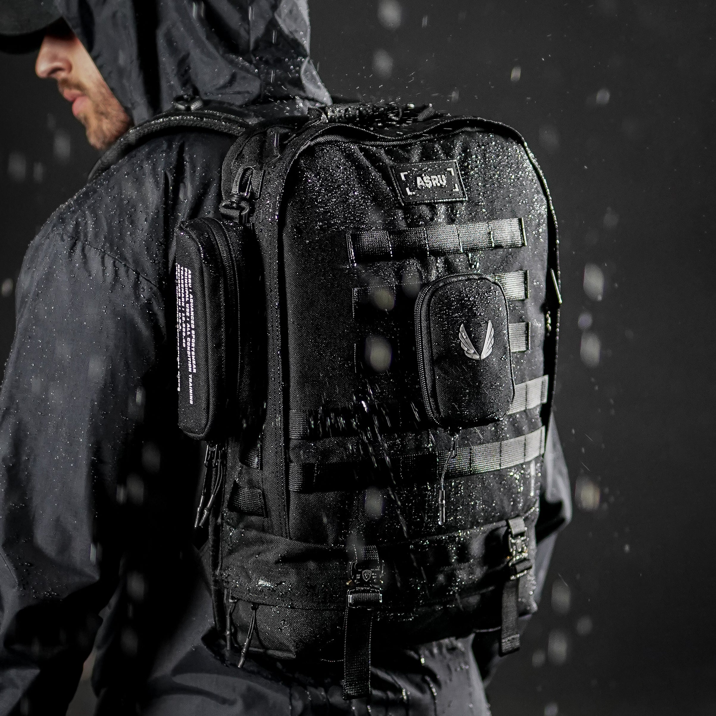 0275 Modular Everyday Pack in black, worn by model in rain