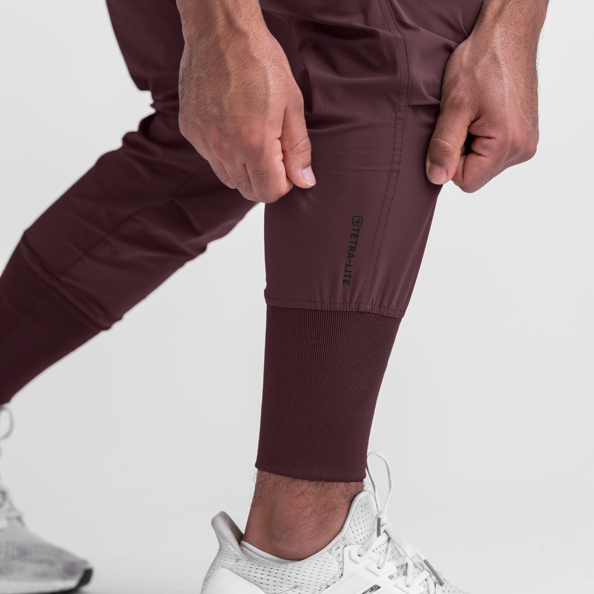 Tetra-Lite® Cargo High Rib Jogger in Faded Plum worn by model, detail view of calf cuff