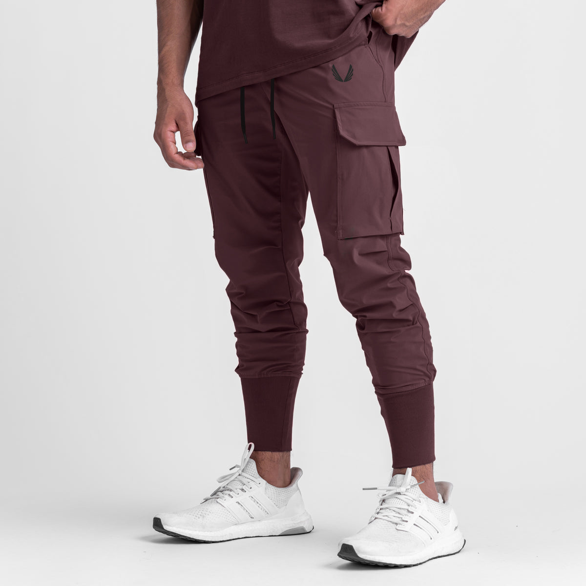 Tetra-Lite® Cargo High Rib Jogger in faded plum, modeled with white sneakers, front view