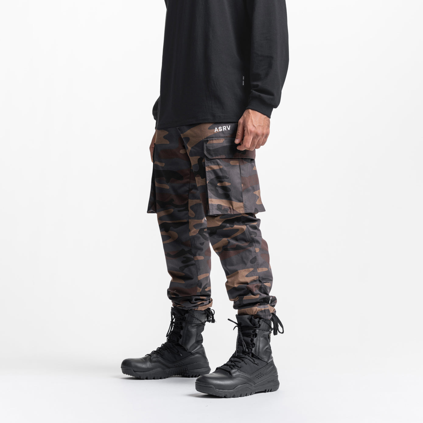 Weather-Ready Technical Cargo Pant in rust camo, worn with black boots, side view