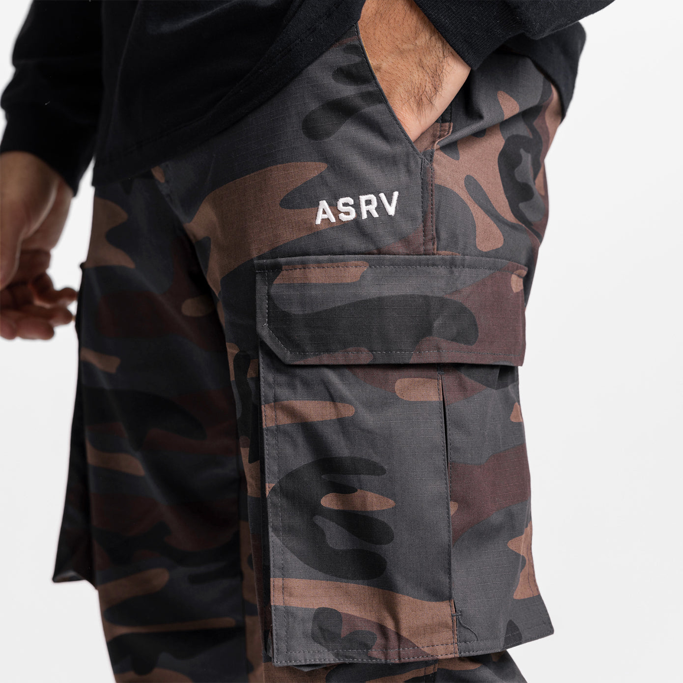 Weather-Ready Technical Cargo Pant in rust camo worn by model, side detail view showing cargo pocket and ASRV branding